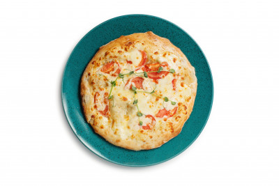 Кубдарі з пряним м'ясом телятини, томатами та сиром